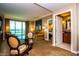 Bright living room with dining area and access to balcony at , Las Vegas, NV 89109