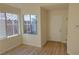 Home entryway with wood-look floors and neutral colors at 10512 Beachwalk Pl, Las Vegas, NV 89144