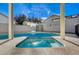 Inviting pool and spa with covered patio at 2101 Autumn Lull Dr, Las Vegas, NV 89146