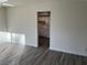 Living room with view into kitchen and wood-look floors at 2108 San Jose Ave, Las Vegas, NV 89104