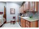 Bedroom features a convenient wet bar with sink, cabinets, and granite countertops at 2378 Sandstone Cliffs Dr, Henderson, NV 89044