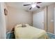 Bright bedroom with double doors and ceiling fan at 2686 African Violet Ave, Henderson, NV 89074