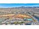 Aerial view of a residential community showcasing the ballpark and community pool at 2694 Marvel Astoria St, Henderson, NV 89044