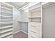 Organized closet showcasing adjustable shelving, a clothing rod, and carpeted floors at 2694 Marvel Astoria St, Henderson, NV 89044