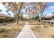 Landscaped walkway with mature trees in a sunny community at 2847 San Martin Ct, Las Vegas, NV 89121