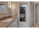 Bathroom with vanity, a walk-in closet and linen closet at 373 Bradford Dr, Henderson, NV 89074