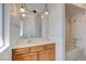 Bathroom vanity with decorative lights and white countertop at 4440 E Boston Ave, Las Vegas, NV 89104