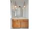 Bathroom vanity with decorative lights and white countertop at 4440 E Boston Ave, Las Vegas, NV 89104