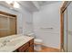 Bathroom featuring a framed vanity, ceramic tile flooring, and glass shower enclosure at 4440 E Boston Ave, Las Vegas, NV 89104