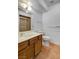 Bathroom featuring a framed vanity, ceramic tile flooring, and glass shower enclosure at 4440 E Boston Ave, Las Vegas, NV 89104