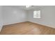 Bedroom with wood-look floors and a window at 4440 E Boston Ave, Las Vegas, NV 89104