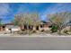 Charming curb appeal with mature landscaping, desert rock accents and a well-maintained lawn at 4440 E Boston Ave, Las Vegas, NV 89104