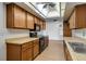 Spacious kitchen boasting wood cabinets, countertop space, and modern appliances at 4440 E Boston Ave, Las Vegas, NV 89104