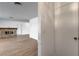 Spacious living room featuring new floors and brick fireplace at 4440 E Boston Ave, Las Vegas, NV 89104