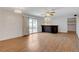 Bright living room featuring updated floors, recessed lighting, and a sliding glass door at 4440 E Boston Ave, Las Vegas, NV 89104