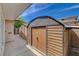 The side of the property features wood sheds for storage at 4440 E Boston Ave, Las Vegas, NV 89104