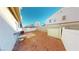 Small backyard with storage shed and gravel at 6431 Saddle Up Ave # 103, Henderson, NV 89011