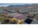 Night aerial view of house with backyard, landscaping, and solar panels at 7148 Stanley Frederick St, Las Vegas, NV 89166