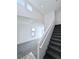 Staircase leading to upper level with grey carpet at 7637 Constellation St, Las Vegas, NV 89123