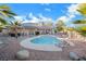 Backyard oasis with kidney shaped pool and solar panels at 8830 Rancho Destino Rd, Las Vegas, NV 89123