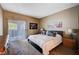 Spacious bedroom with plush carpet and access to a private balcony at 9000 Las Vegas Blvd # 2127, Las Vegas, NV 89123