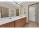 Clean bathroom with double vanity and a shower/tub combo at 9161 Horizon Mist Ave, Las Vegas, NV 89178
