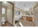 Elegant bathroom with double vanity, soaking tub, and separate shower at 9161 Horizon Mist Ave, Las Vegas, NV 89178
