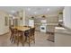 Spacious kitchen featuring granite counters and breakfast bar at 9161 Horizon Mist Ave, Las Vegas, NV 89178