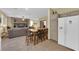 Open concept kitchen and living area, featuring a breakfast bar at 9161 Horizon Mist Ave, Las Vegas, NV 89178