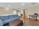 Spacious living area featuring hardwood floors and access to other rooms at 9161 Horizon Mist Ave, Las Vegas, NV 89178