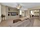 Living room with built-in shelving and access to bedroom at 9161 Horizon Mist Ave, Las Vegas, NV 89178