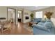 Cozy living room with hardwood floors and a view of a bedroom at 9161 Horizon Mist Ave, Las Vegas, NV 89178