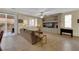 Bright living room with patio access and built-ins at 9161 Horizon Mist Ave, Las Vegas, NV 89178