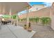 Covered patio with seating area and gravel yard at 9161 Horizon Mist Ave, Las Vegas, NV 89178