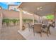 Relaxing covered patio with outdoor furniture at 9161 Horizon Mist Ave, Las Vegas, NV 89178