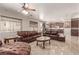 Relaxing living room with leather furniture and tile flooring at 9641 Cripple Gulch Ct, Las Vegas, NV 89178