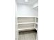 White shelves in a well-lit pantry at 9701 Ann Arbor Ln, Las Vegas, NV 89134