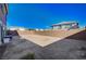 Large backyard with gravel and block wall at 10306 Coastline Creek Ct, Las Vegas, NV 89141