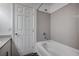 Clean bathroom with shower/tub combo and tile flooring at 10306 Coastline Creek Ct, Las Vegas, NV 89141