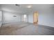 Bright bedroom featuring carpet, neutral walls, and ample space at 10306 Coastline Creek Ct, Las Vegas, NV 89141