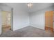 Bright bedroom with carpet, closet and neutral decor at 10306 Coastline Creek Ct, Las Vegas, NV 89141