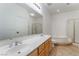 Bathroom with double vanity, large soaking tub, and separate shower at 11017 Ladyburn Ct, Las Vegas, NV 89141