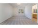 Bright bedroom with neutral carpeting and an ensuite bathroom at 11017 Ladyburn Ct, Las Vegas, NV 89141