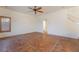 Empty bedroom with tile flooring and ceiling fan at 11017 Ladyburn Ct, Las Vegas, NV 89141