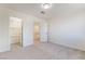 Spacious bedroom with neutral walls and carpet, including a walk-in closet at 11017 Ladyburn Ct, Las Vegas, NV 89141