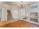 Dining room with tile floors and a modern chandelier at 11017 Ladyburn Ct, Las Vegas, NV 89141