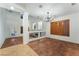 Elegant dining room with wood shutters and chandelier at 11017 Ladyburn Ct, Las Vegas, NV 89141