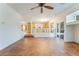 Living room with tiled floors and open concept to kitchen at 11017 Ladyburn Ct, Las Vegas, NV 89141