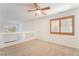 Open loft area with ceiling fan and window with shutters at 11017 Ladyburn Ct, Las Vegas, NV 89141