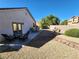 Spacious backyard with patio furniture and fountain at 1260 Corista Dr, Henderson, NV 89052